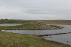 Broch on a loch above Eshaness